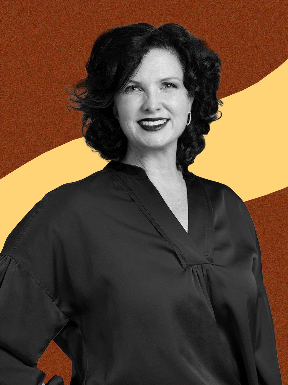 A black and white photo of Kathy Baughman McLeod cut out on top of an orange-speckled background with a light yellow swoosh line behind her.