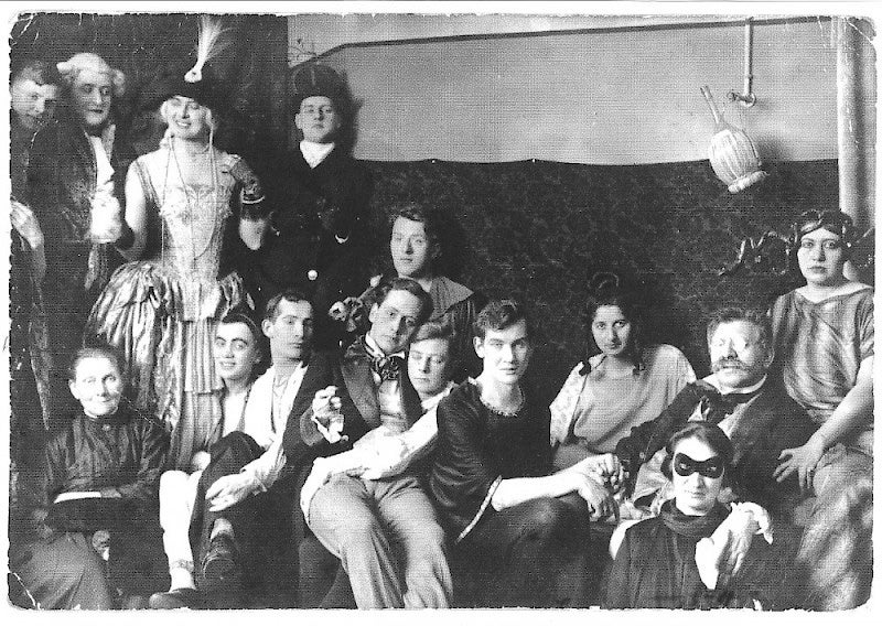 Historical photo: Members of the Magnus Hirschfeld Institute pose for a photo. Many are cross-dressed and/or are transgender. Hirschfeld is in the bottom right.