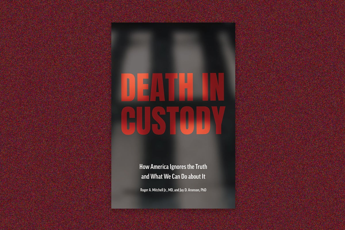 Book cover: "Death in Custody: How America Ignores the Truth and What we Can Do about it." By Roger A Mitchell Jr MD and Jay D Aronson, PHD. The book cover is of jail cell bar shadows and the text is in bright red. The cover is on a red speckled background.