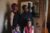 Denedra Levy and three of her children stand for a portrait in their new home
