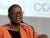 世界资源研究所副总裁兼非洲区域主任Wanjira Mathai坐在一个小组上，对着麦克风讲话。
