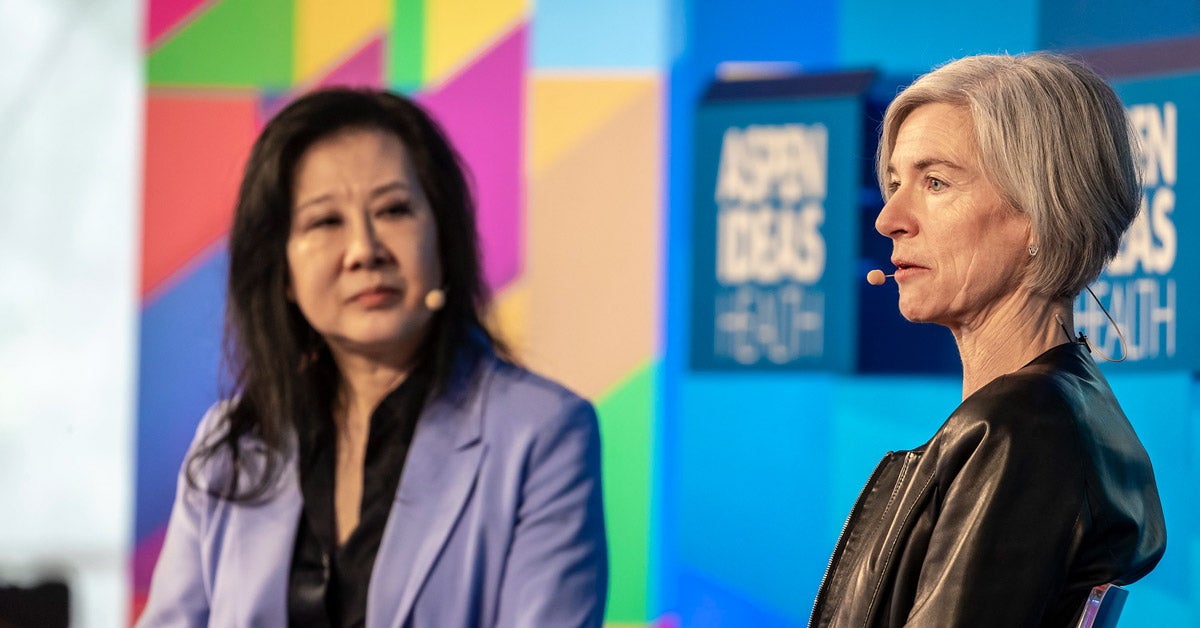 Jennifer Doudna speaks at the Aspen Ideas Health Conference. In the background is her interviewer, Alice Park.