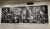 Forty black and white portraits hang on a gallery wall in a grid. The photos are of unhoused people in various expressions.