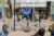 Children play inside a fenced playground in Plaza Soledad, Mexico City.