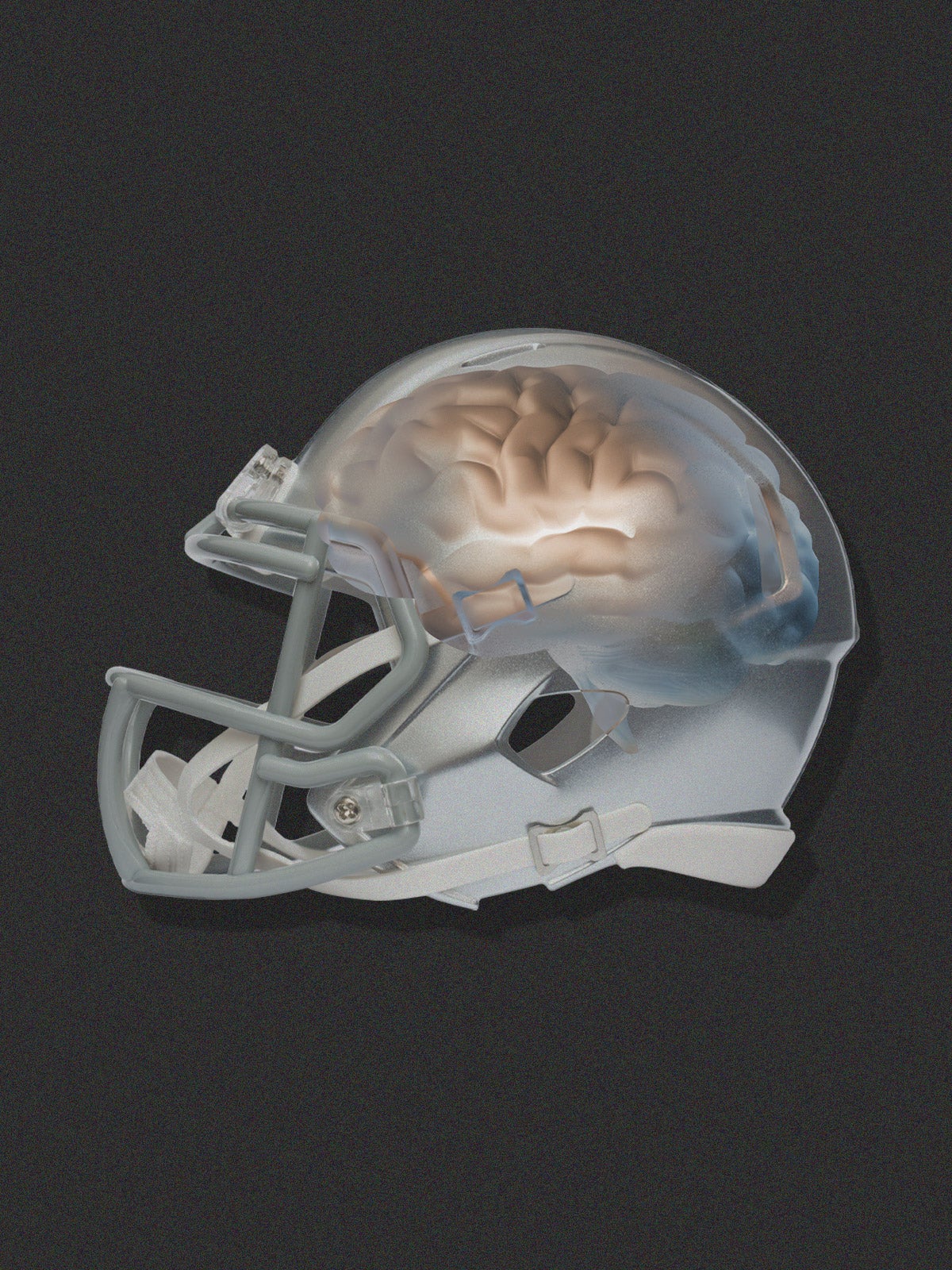 Photo illustration: A grey football helmet is overlain over a glowing brain.