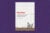 Book cover: “Way Home: Journeys through Homelessness” by Josephine Ensign. The cover is an image of a white, metal-sided building with an upside down shopping cart on the sidewalk in front of top it. The cover rests on a purple background.